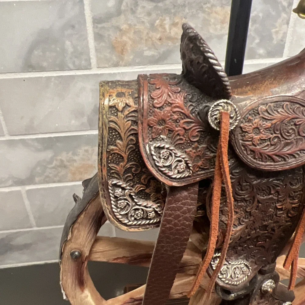 Western vintage Saddle Lamp rope on the saddle, sitting on a wheel/NO LAMP SHADE